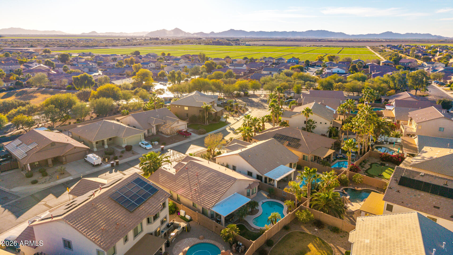 45144 West Desert Garden Road Maricopa, AZ 85139 - Photo 41 of 52 an aerial view of residential houses with outdoor space