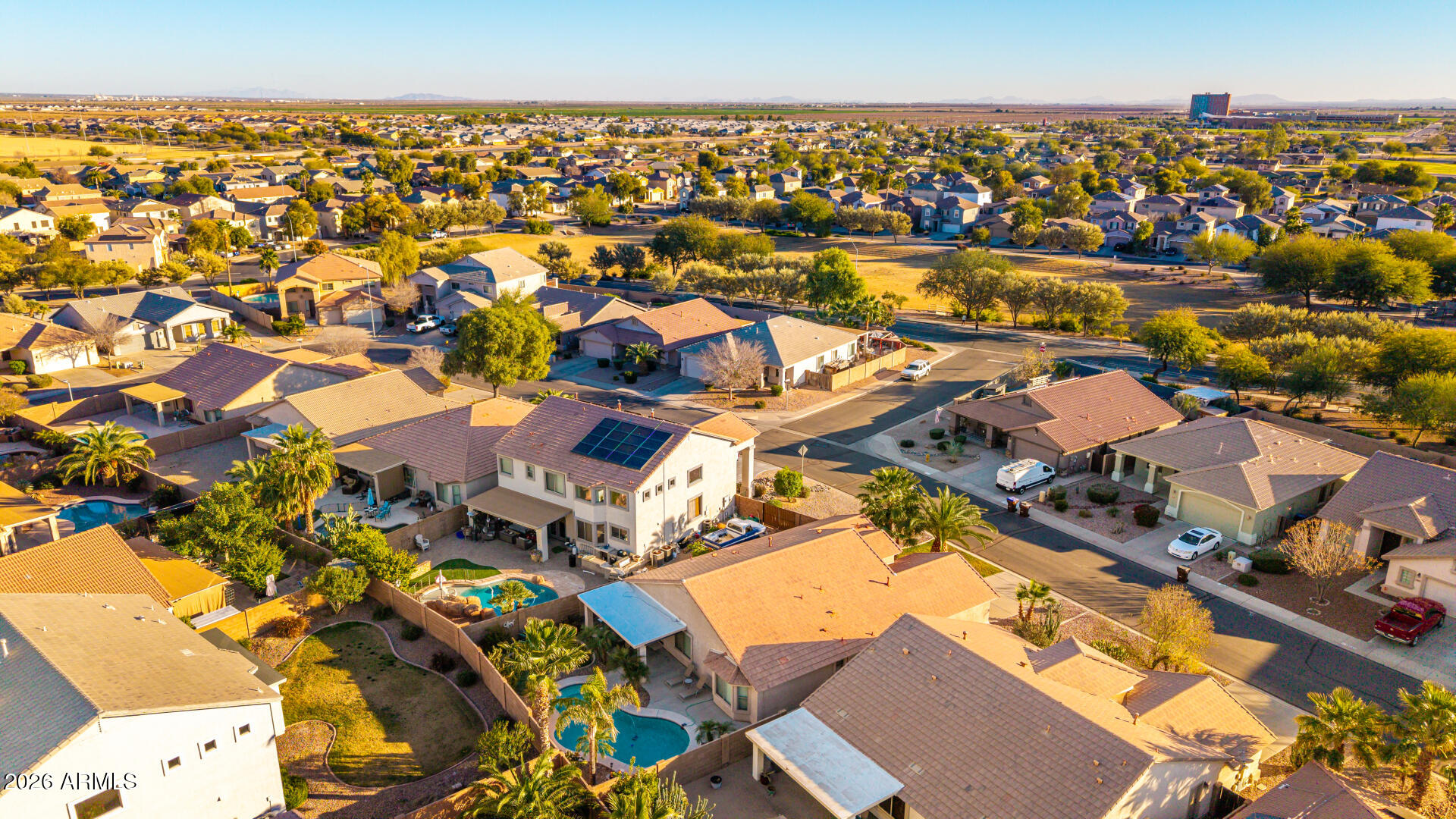 45144 West Desert Garden Road Maricopa, AZ 85139 - Photo 43 of 52 an aerial view of residential houses with outdoor space