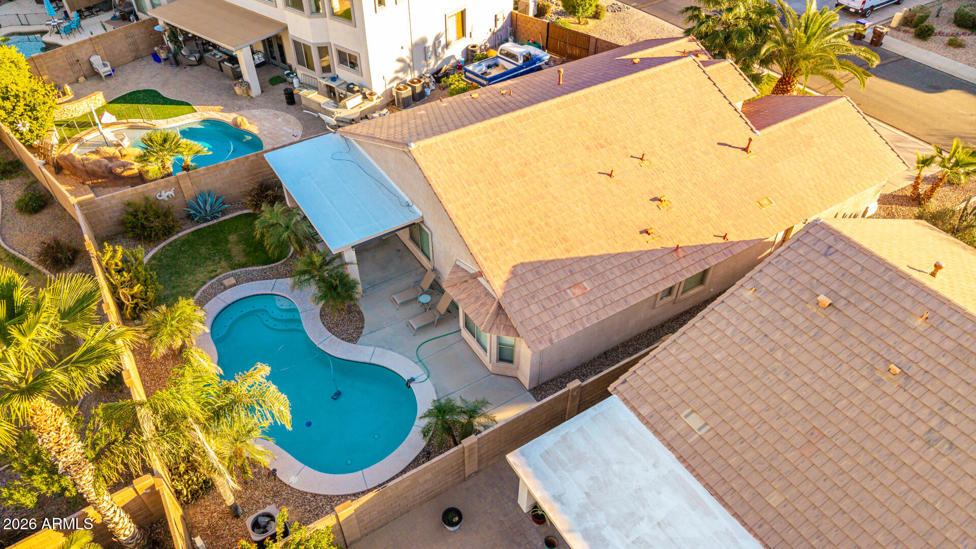 45144 West Desert Garden Road Maricopa, AZ 85139 - Photo 48 of 52 an aerial view of a swimming pool