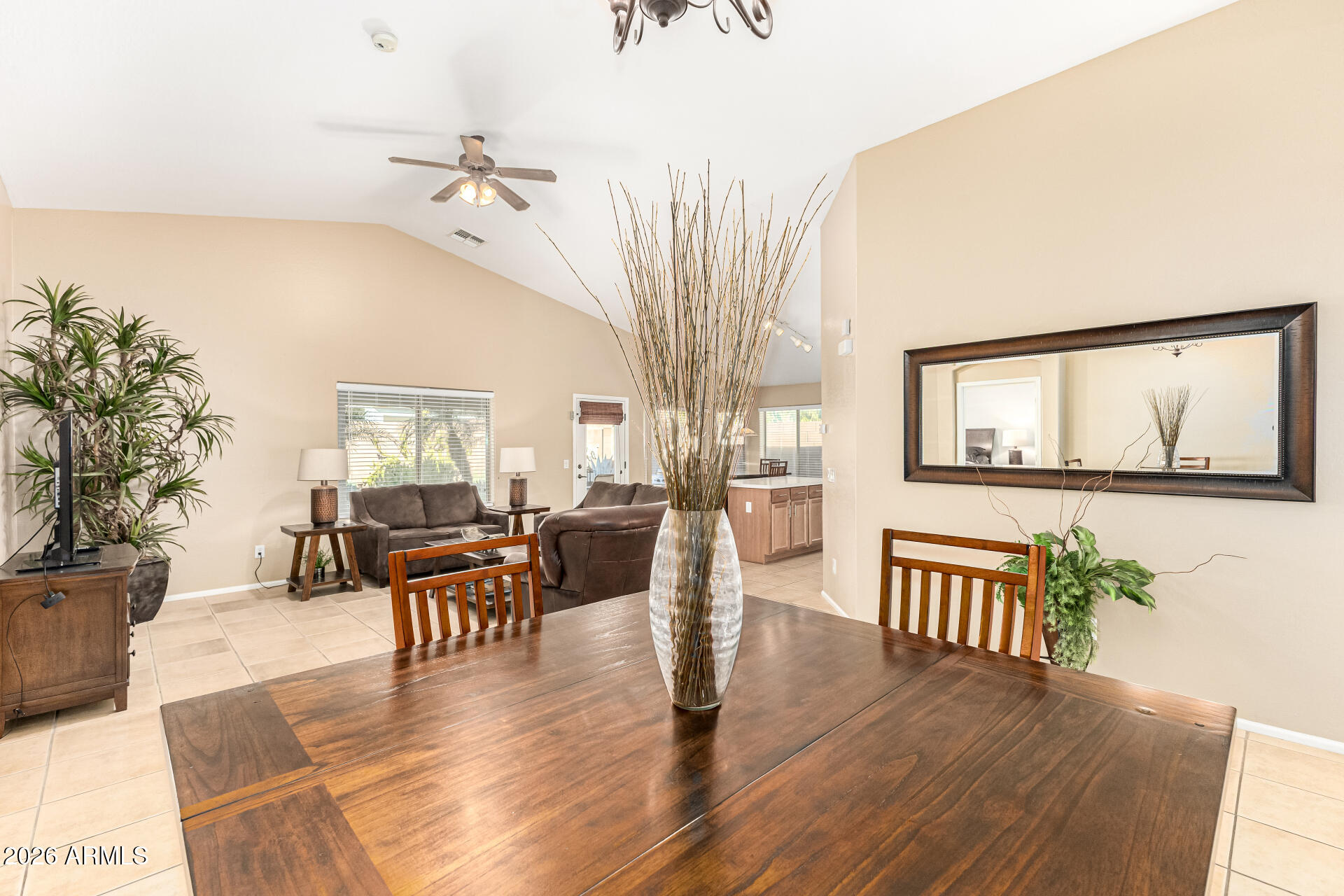 45144 West Desert Garden Road Maricopa, AZ 85139 - Photo 5 of 52 a living room with furniture and a wooden floor
