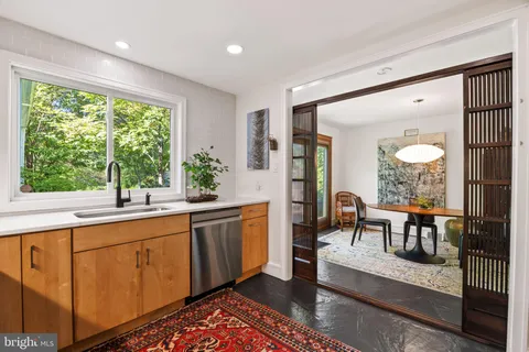 a very nice looking living room with a large window