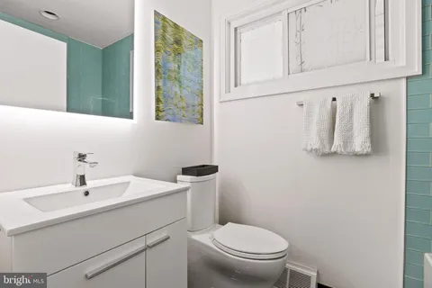 a bathroom with a tub and shower