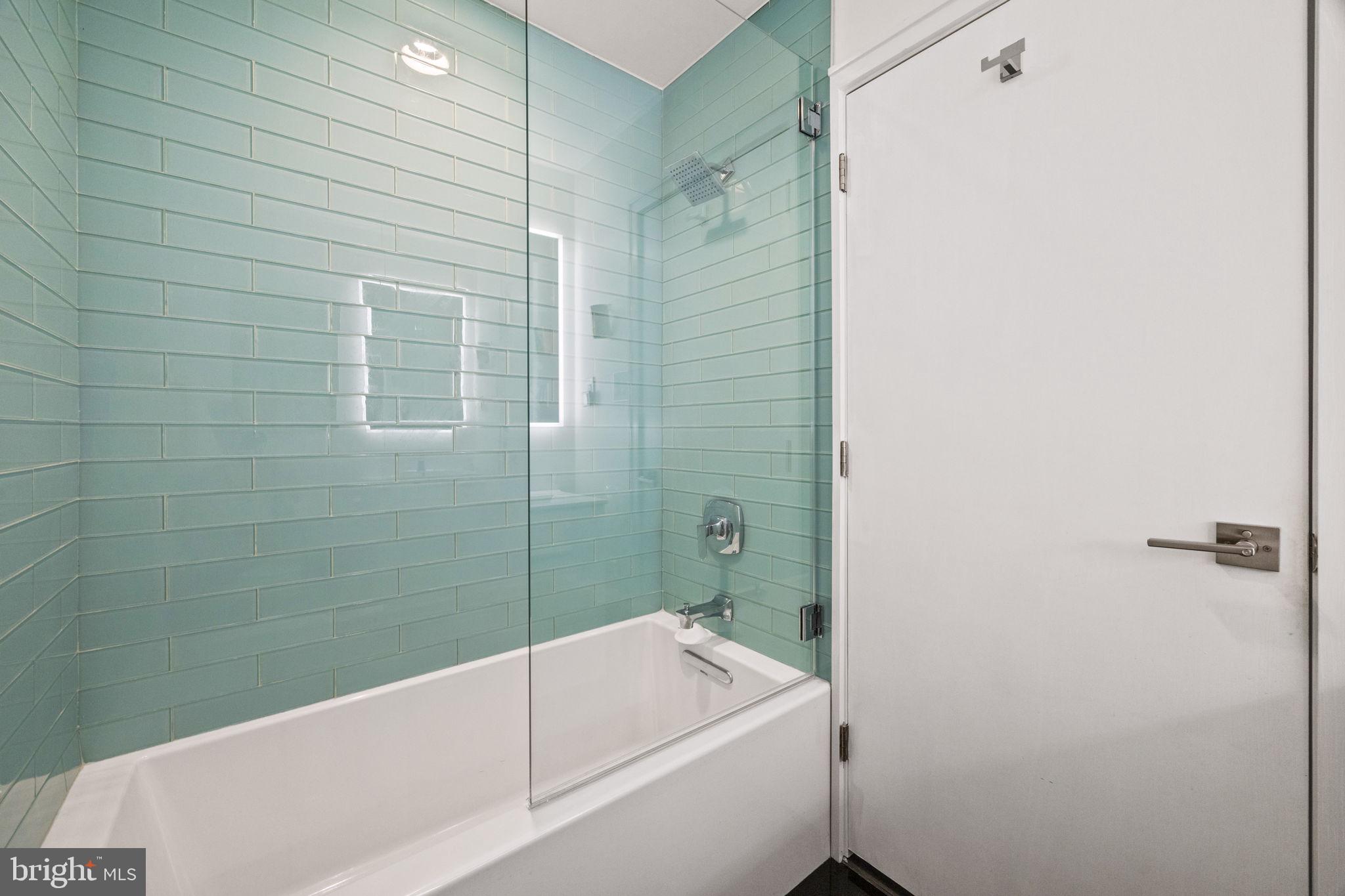 303 Glenway Road Glenside, PA 19038 - Photo 26 of 56 a bathroom with a tub and shower