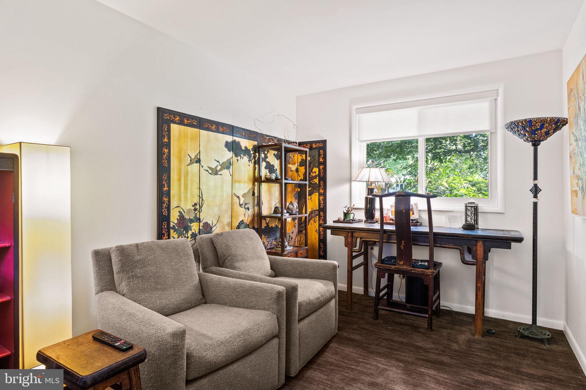 303 Glenway Road Glenside, PA 19038 - Photo 27 of 56 a living room with furniture and a large window