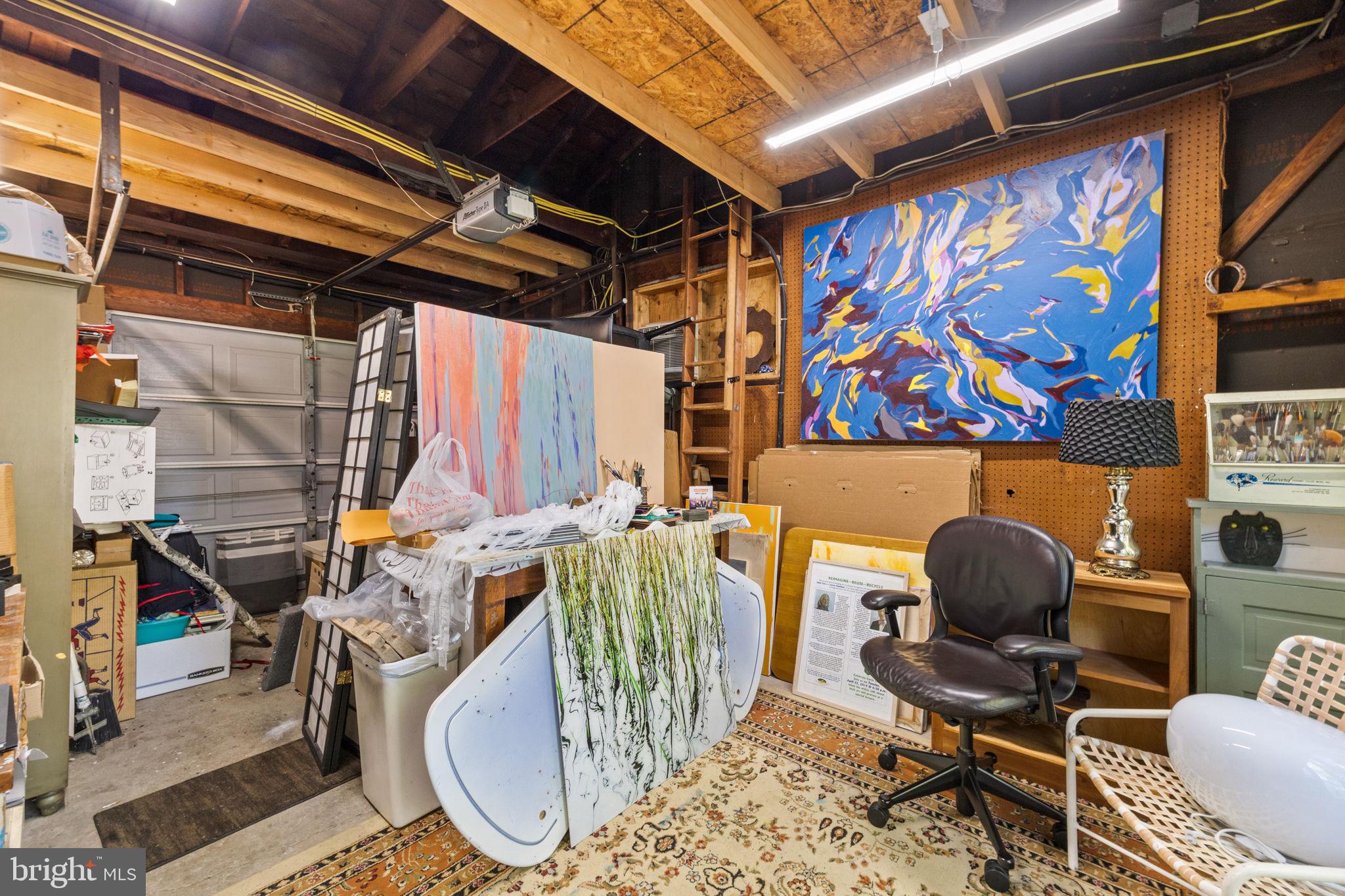 303 Glenway Road Glenside, PA 19038 - Photo 37 of 56 a room with lots of furniture and musical instruments