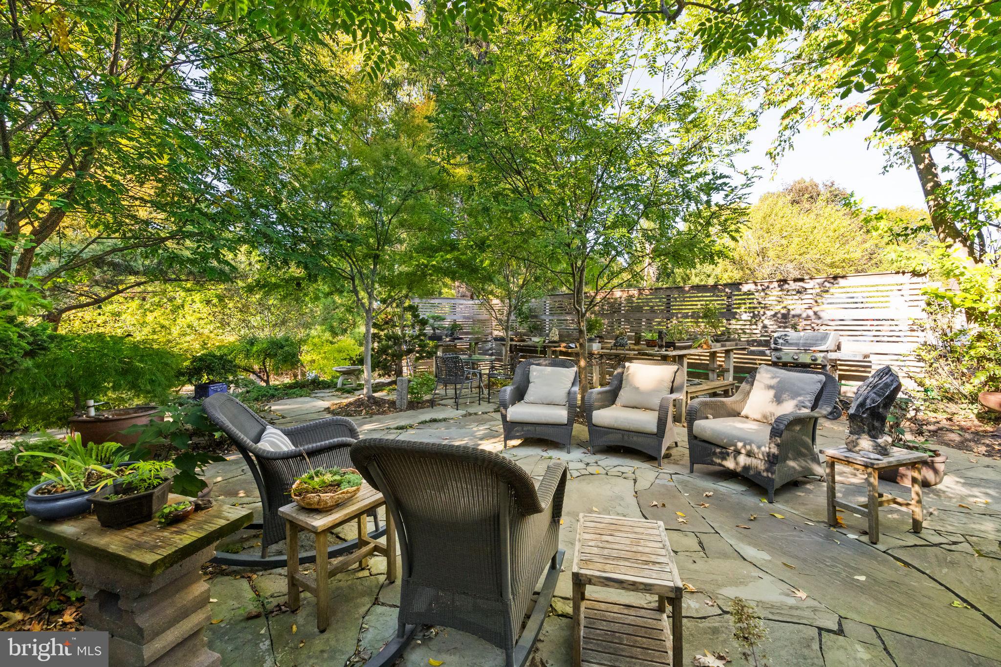 303 Glenway Road Glenside, PA 19038 - Photo 39 of 56 a view of a patio with couches table and chairs and potted plants