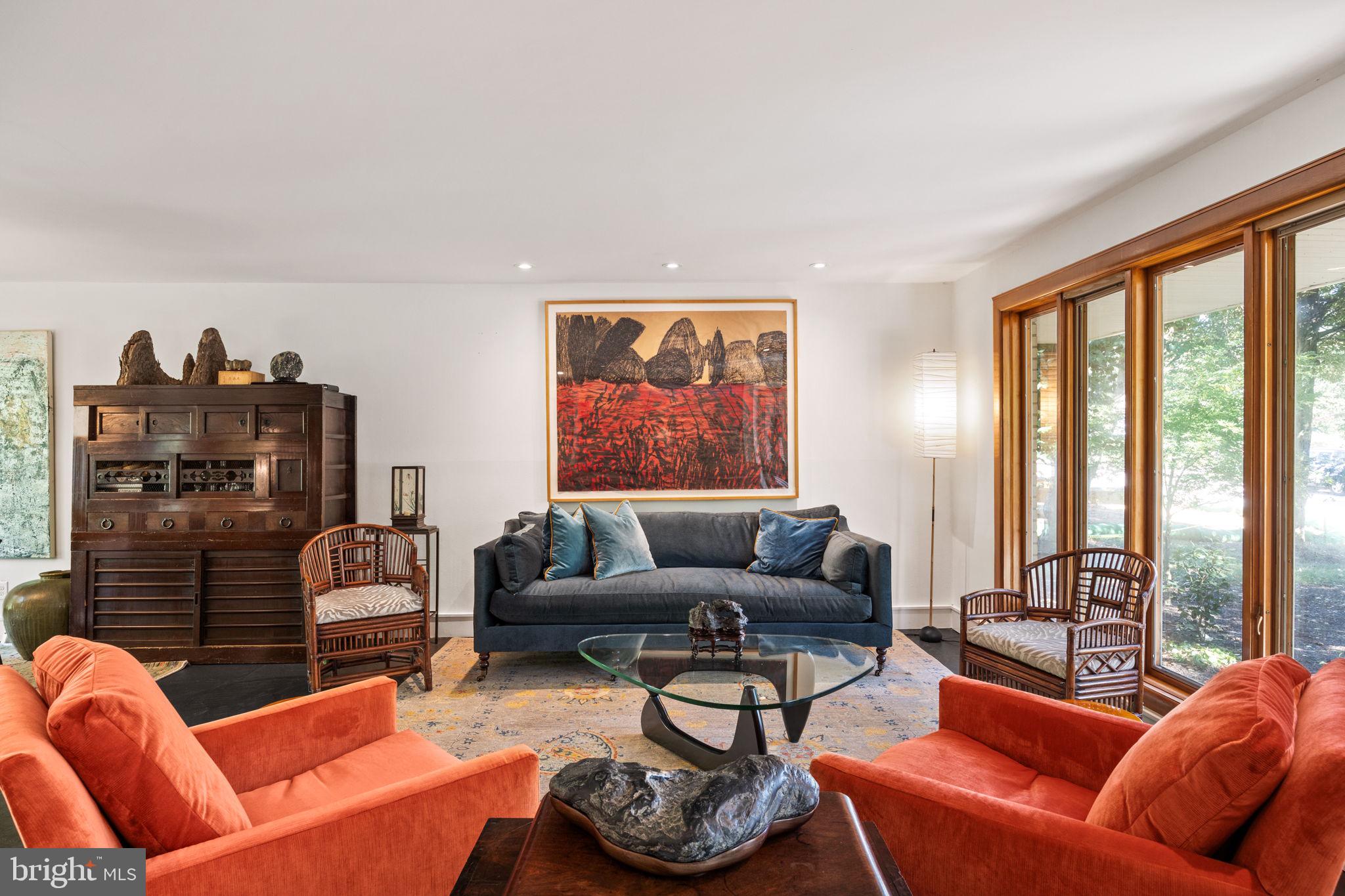 303 Glenway Road Glenside, PA 19038 - Photo 5 of 56 a living room with furniture a rug potted plant and a large window