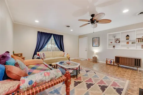 a bedroom with furniture and a window