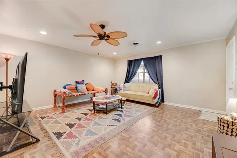 a living room with furniture and a window