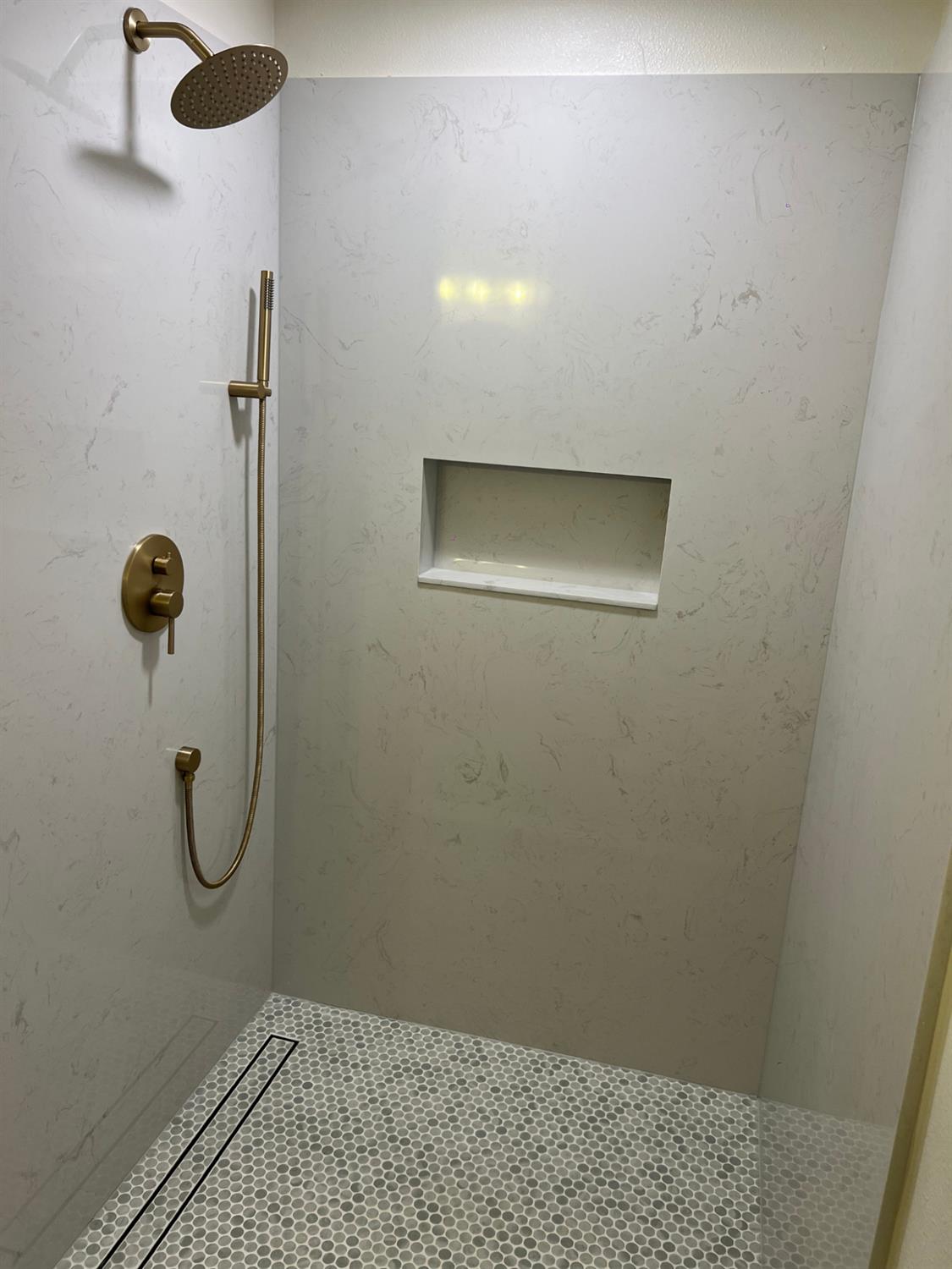 1715 Dallas Street Modesto, CA 95358 - Photo 21 of 35 a bathroom with a shower