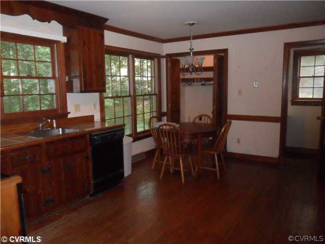 11532 Poplar Ridge Road North Chesterfield, VA 23236 - Photo 3 of 7 a view of a dining room with furniture and window