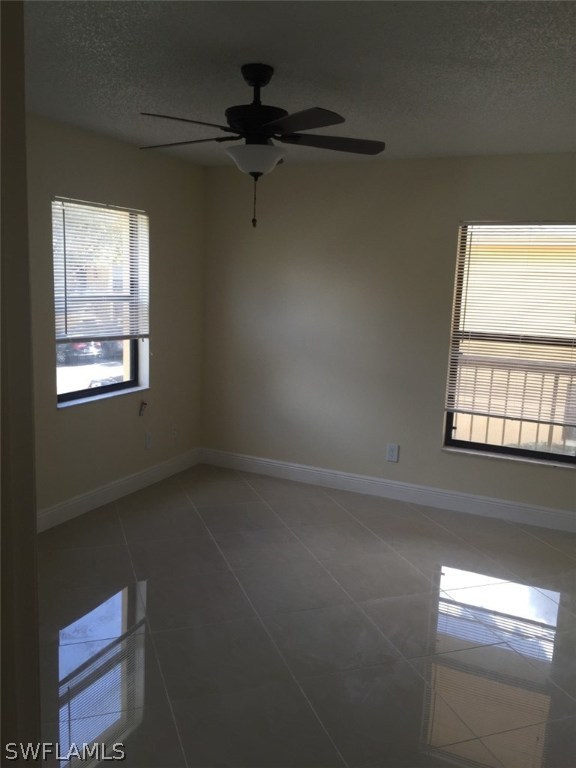 5311 Summerlin Road, Unit 1114 Fort Myers, FL 33919 - Photo 2 of 5 a view of an empty room with a window