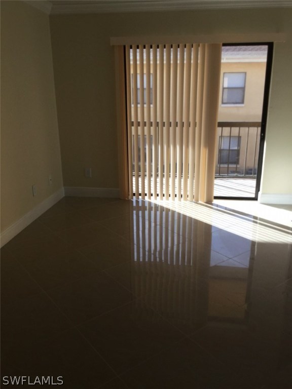 5311 Summerlin Road, Unit 1114 Fort Myers, FL 33919 - Photo 5 of 5 a view of an empty room with a window