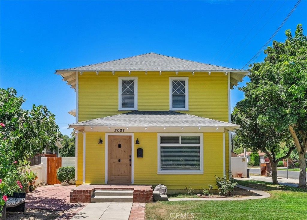 3007 Brockton Avenue Riverside, CA 92501 - Photo 1 of 1 a front view of a house with a yard