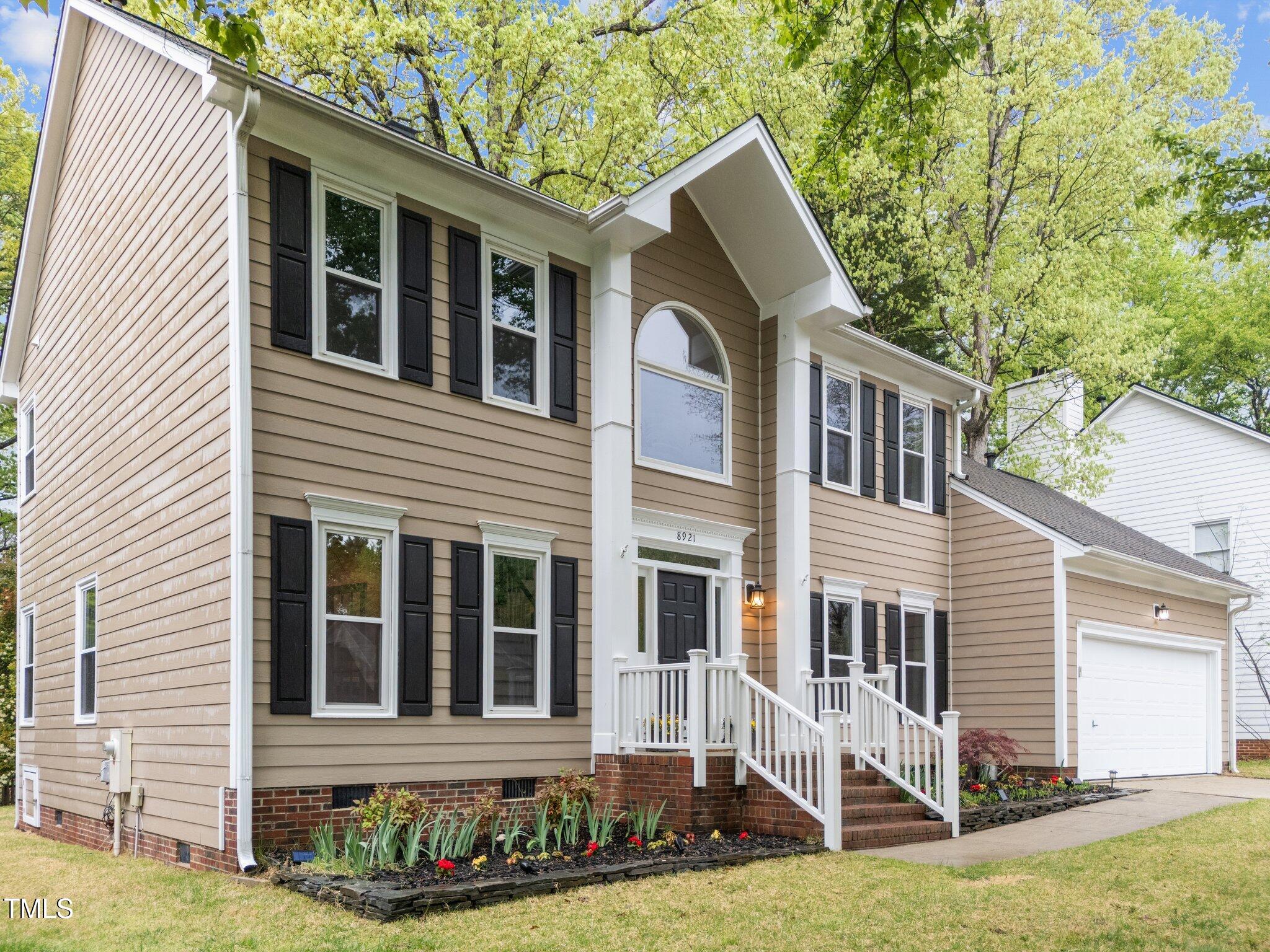 8921 Walking Stick Trail Raleigh, NC 27615 - Photo 2 of 28 3-web-or-mls-DJI_20250407123848_0730_D