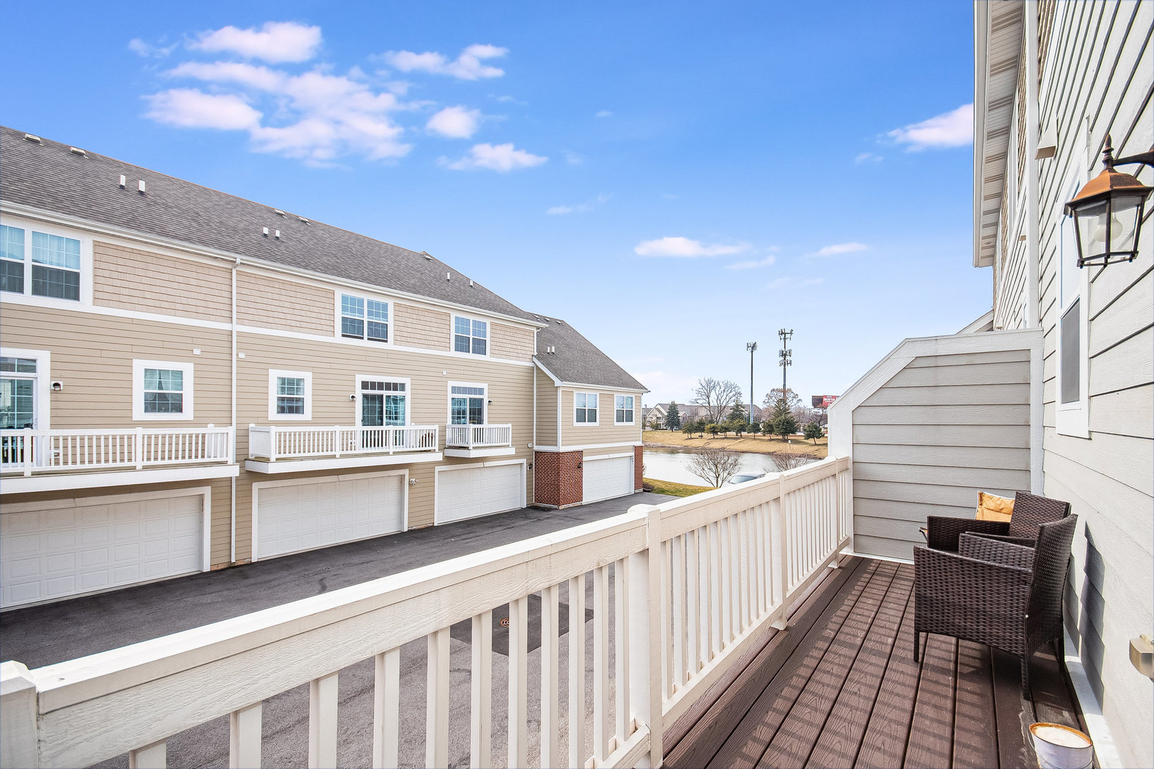 273 Timber Ridge Court Joliet, IL 60431 - Photo 13 of 14 a view of a roof deck with wooden floor and fence