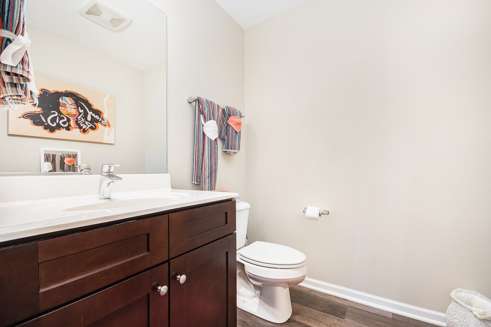 273 Timber Ridge Court Joliet, IL 60431 - Photo 10 of 14 a bathroom with a toilet sink and mirror