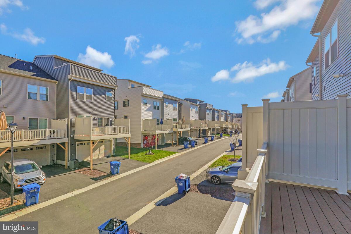 14934 Ring House Road Brandywine, MD 20613 - Photo 16 of 34 a view of a swimming pool with a lounge chairs