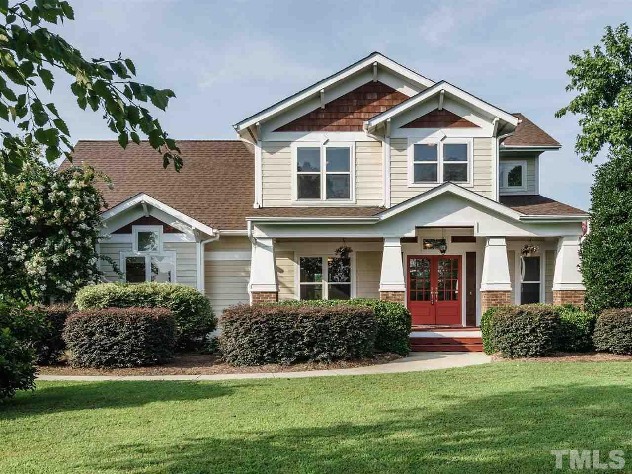 95 Rand Road Raleigh, NC 27603 - Photo 1 of 25 a front view of a house with a yard