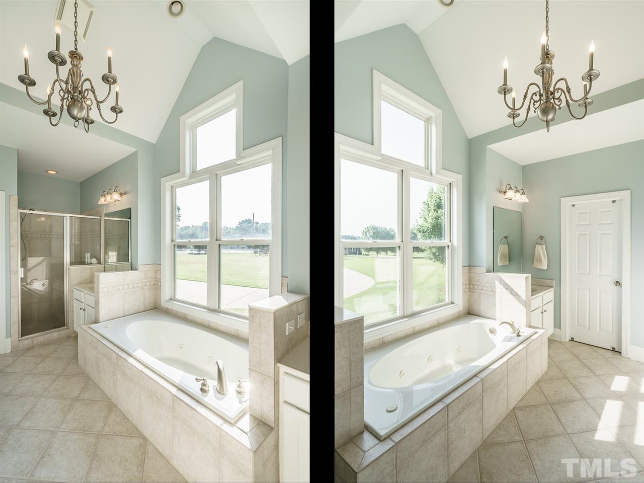 95 Rand Road Raleigh, NC 27603 - Photo 13 of 25 a spacious bathroom with a large tub and shower