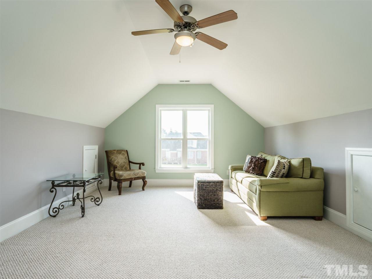 95 Rand Road Raleigh, NC 27603 - Photo 18 of 25 a living room with furniture and a window