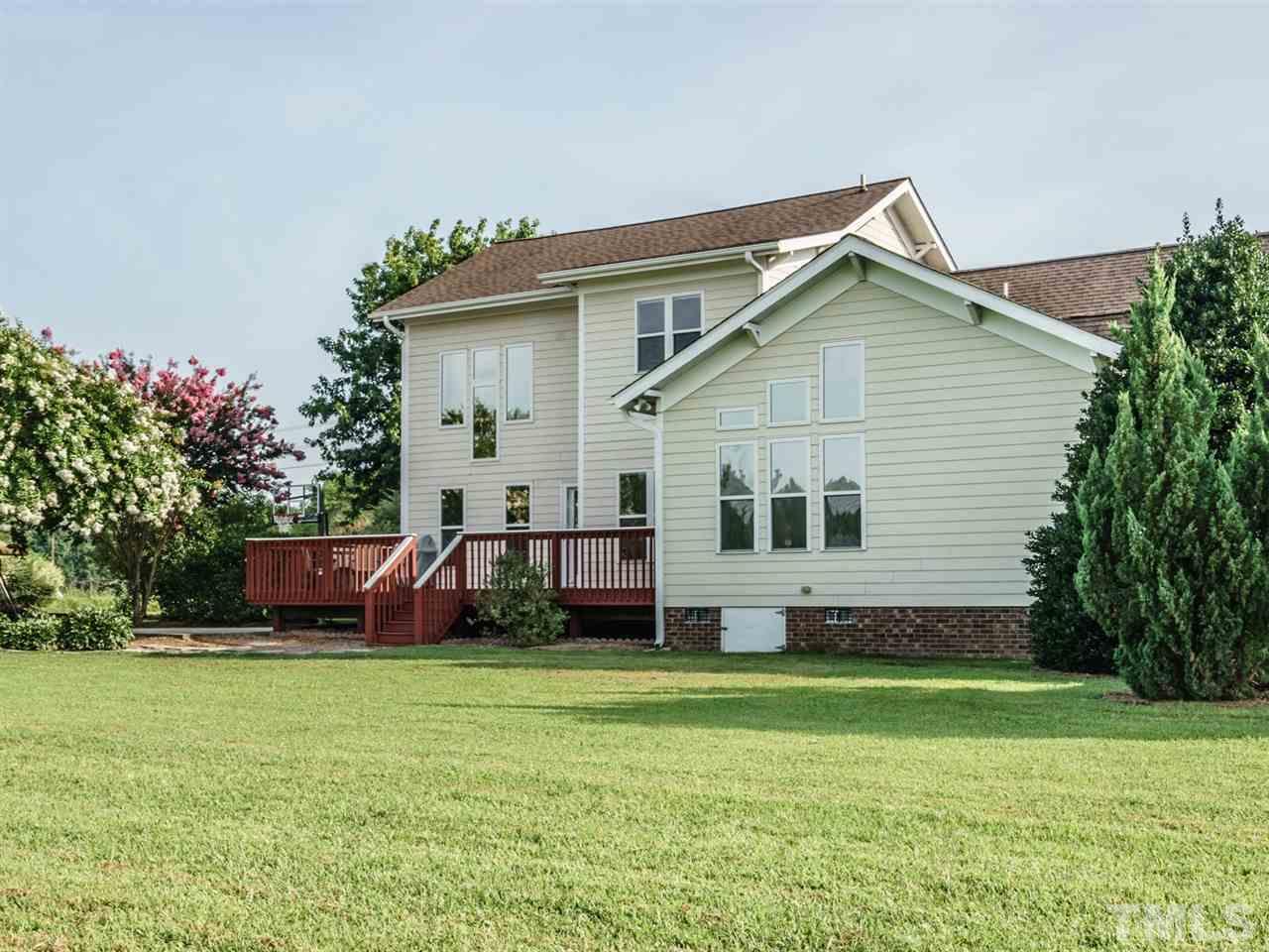 95 Rand Road Raleigh, NC 27603 - Photo 22 of 25 a front view of house with garden