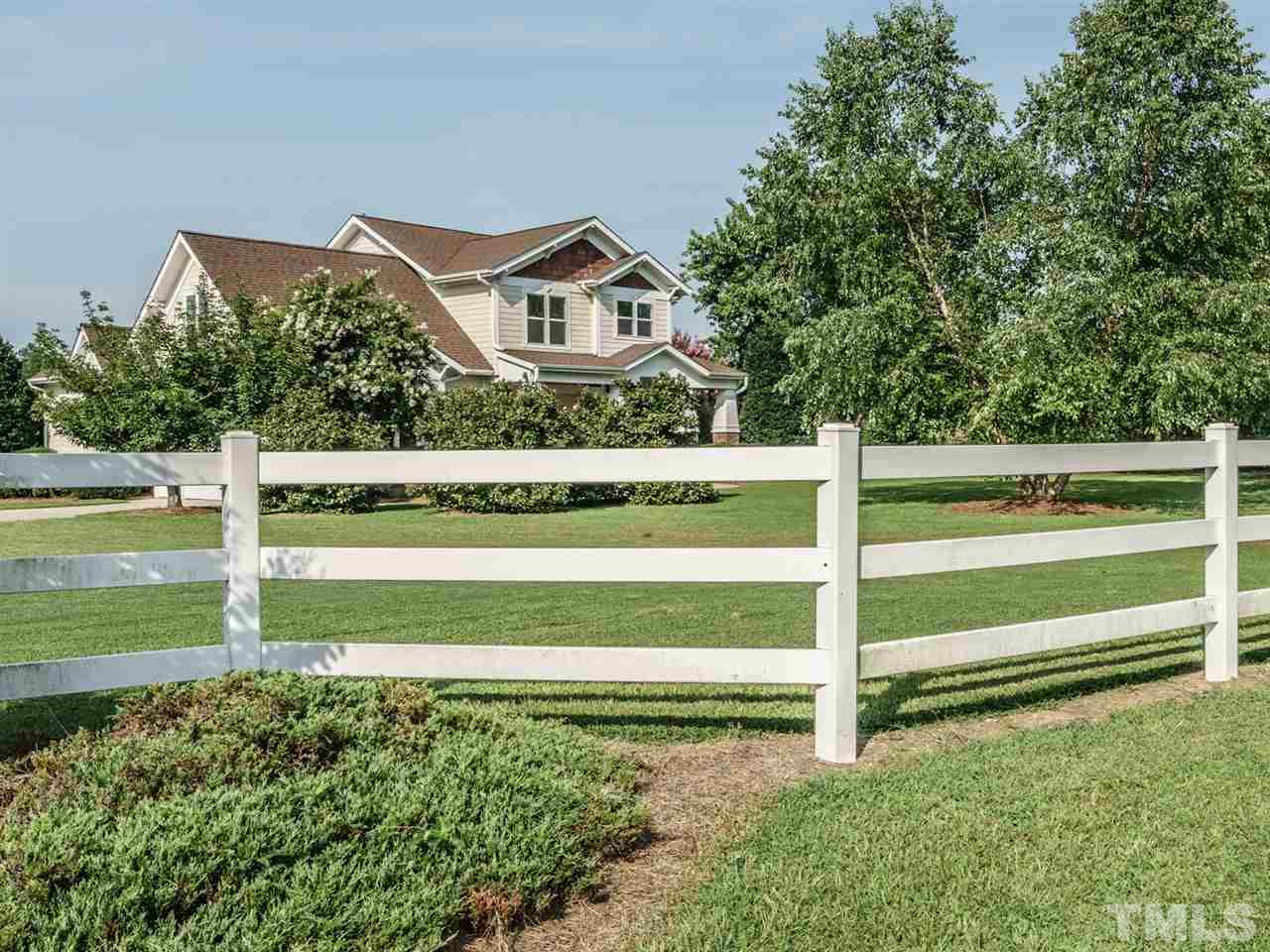 95 Rand Road Raleigh, NC 27603 - Photo 23 of 25 a front view of a house with a yard
