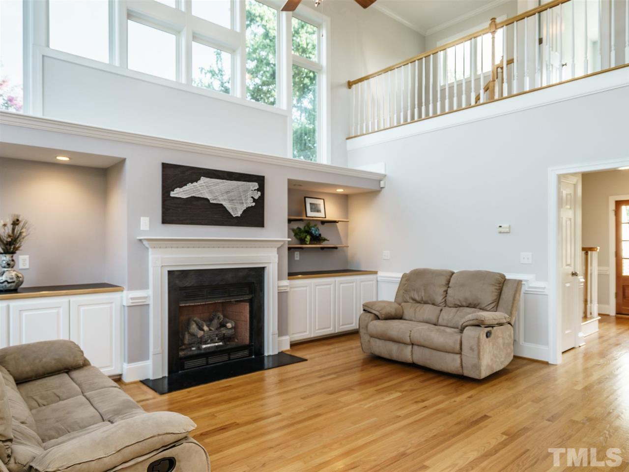 95 Rand Road Raleigh, NC 27603 - Photo 25 of 25 a living room with furniture and a fireplace