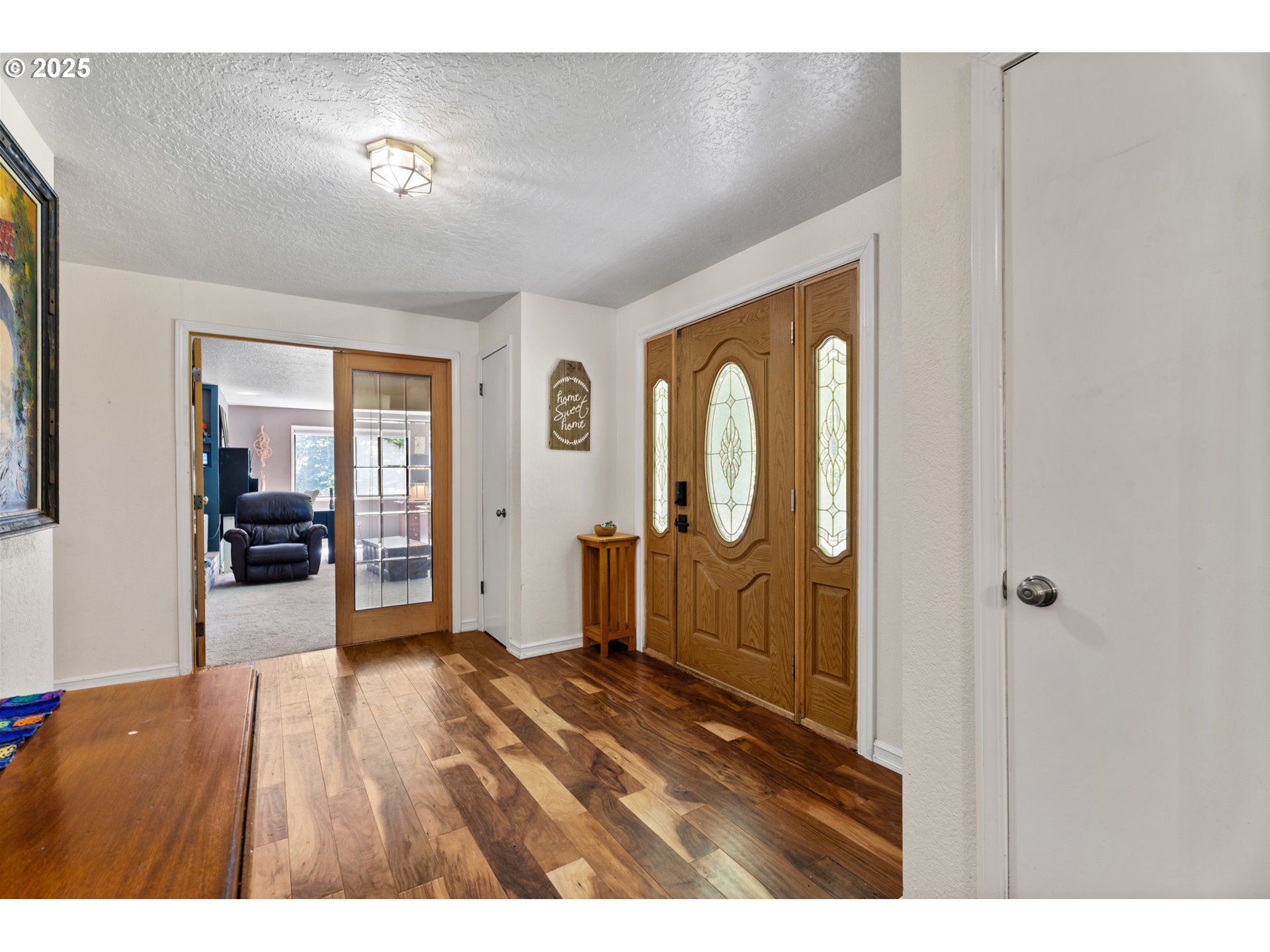 35650 Southeast Barnum Road Sandy, OR 97055 - Photo 13 of 35 a view of an entryway with wooden floor