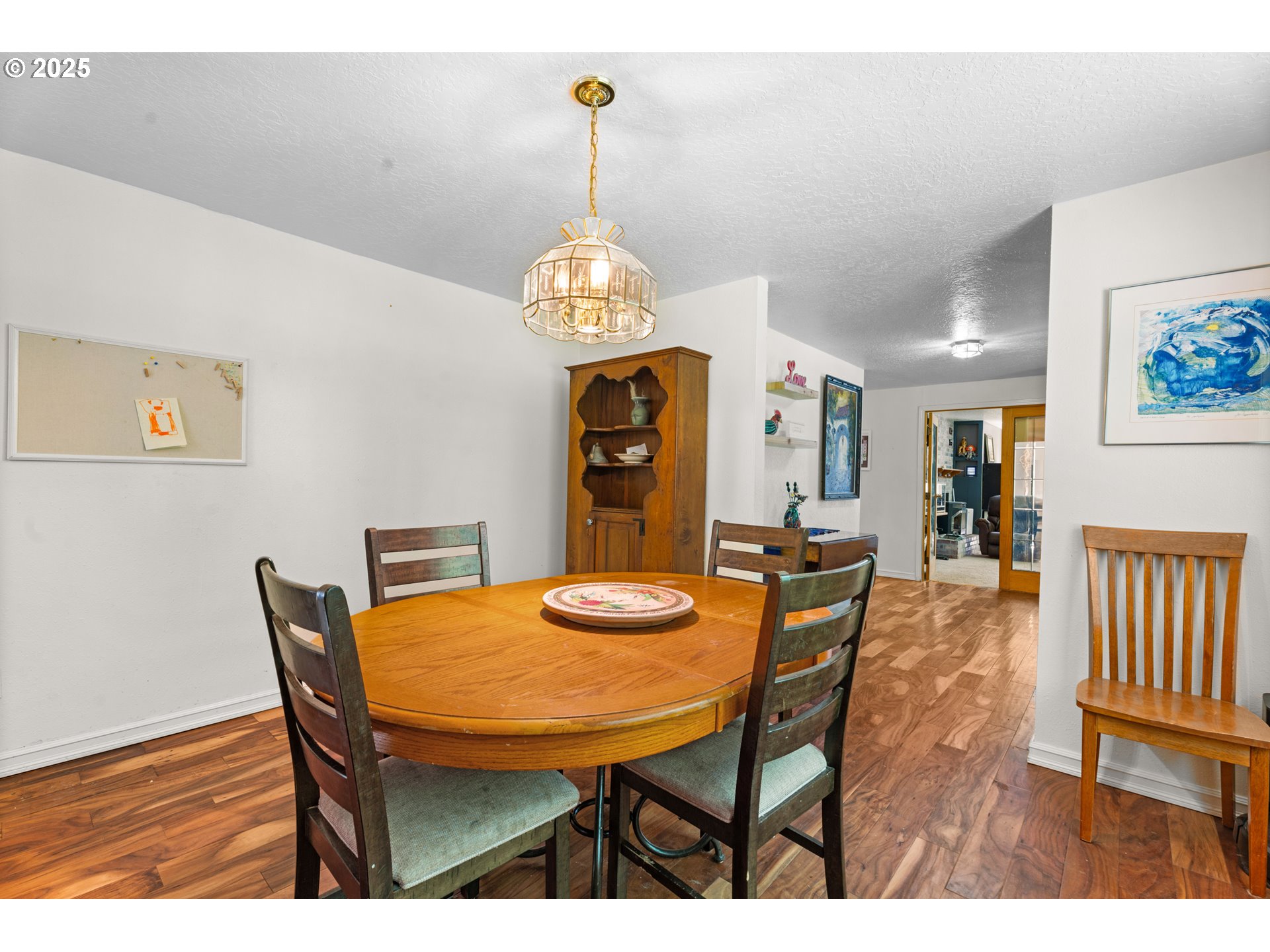 35650 Southeast Barnum Road Sandy, OR 97055 - Photo 15 of 35 a view of a dining room with furniture and wooden floor