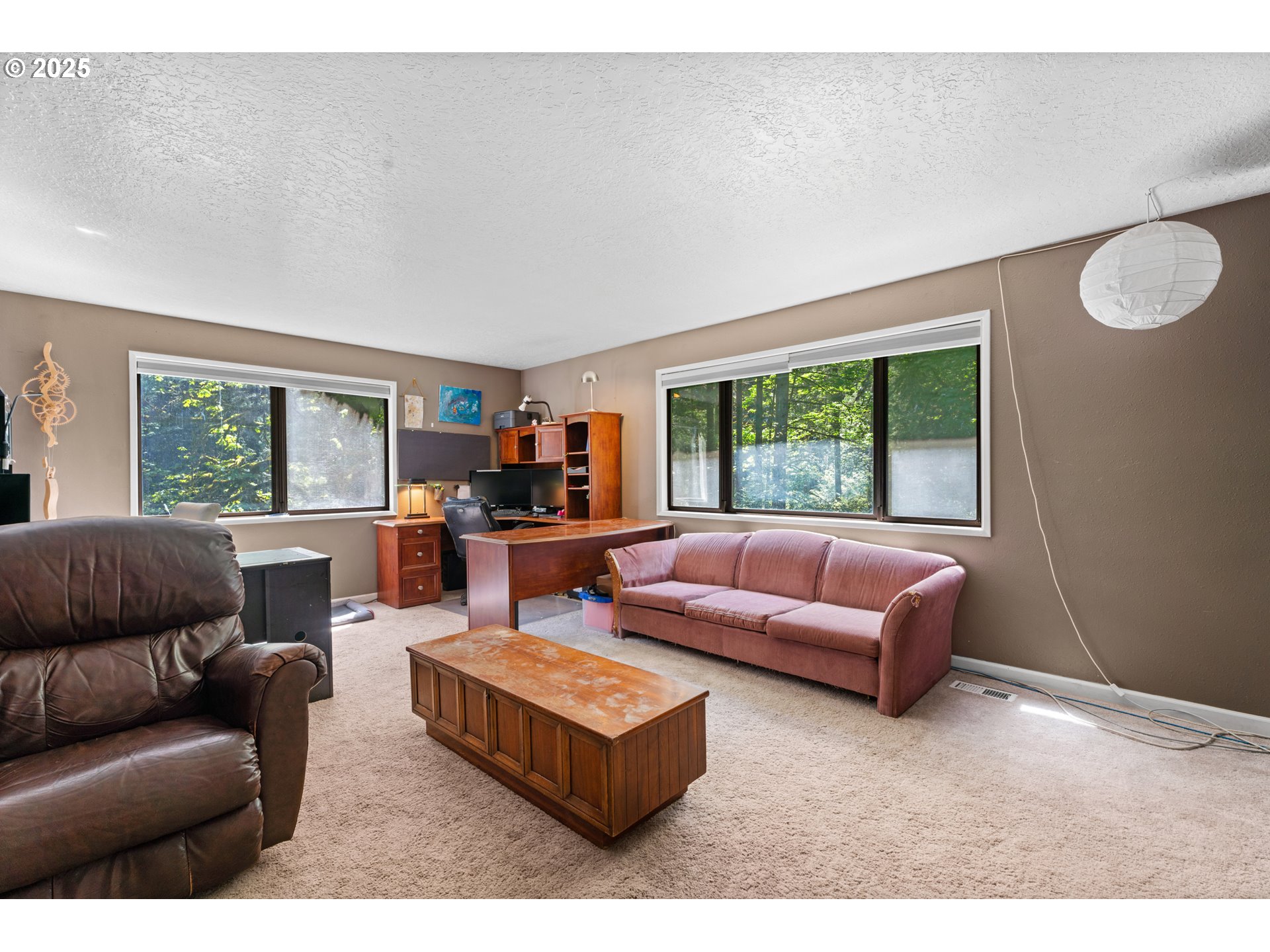 35650 Southeast Barnum Road Sandy, OR 97055 - Photo 23 of 35 a living room with furniture and a large window