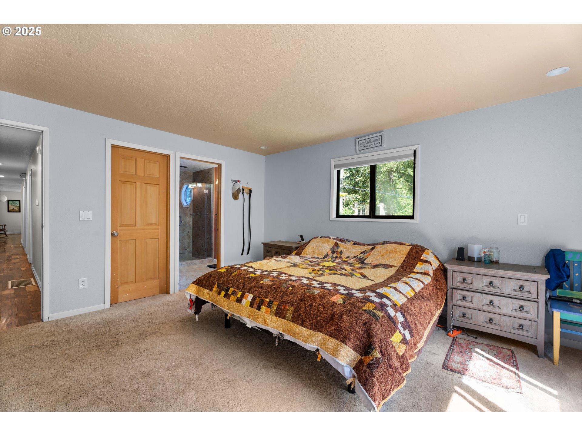 35650 Southeast Barnum Road Sandy, OR 97055 - Photo 25 of 35 a bedroom with a bed and a window