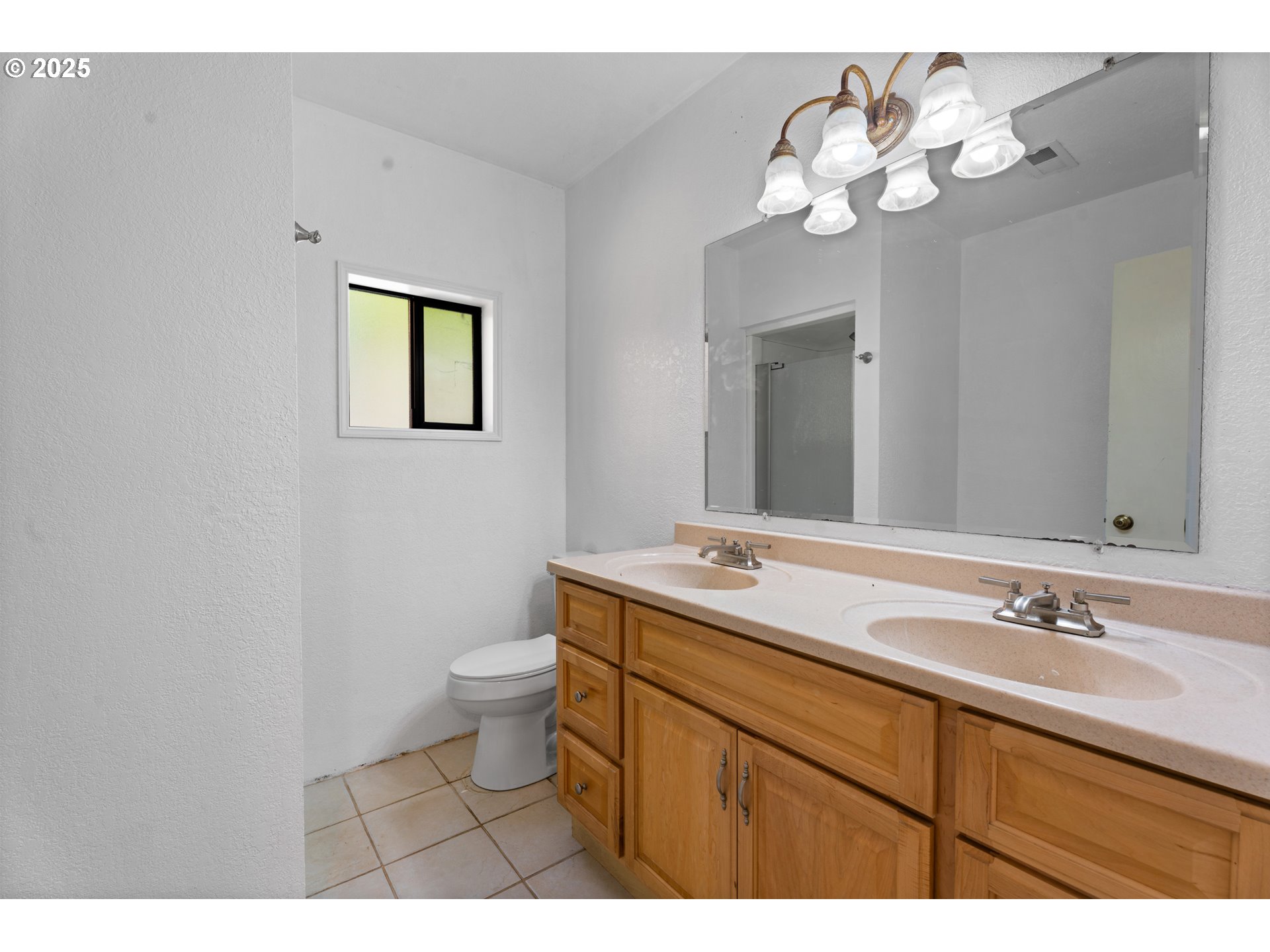 35650 Southeast Barnum Road Sandy, OR 97055 - Photo 34 of 35 a bathroom with a sink vanity and a toilet