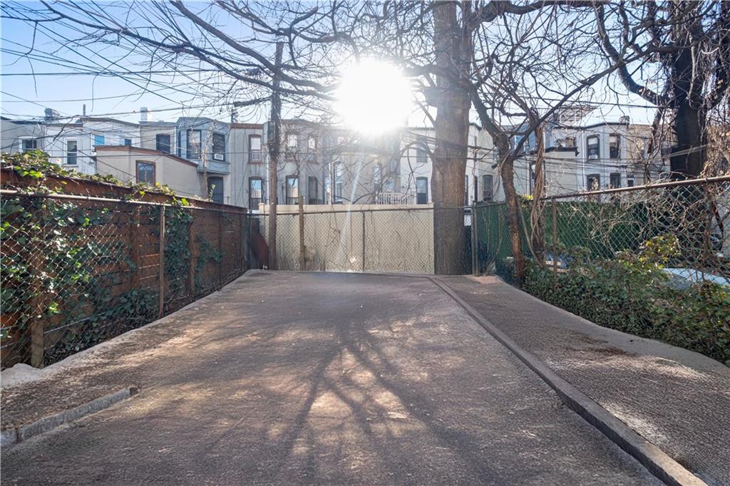 968 St Johns Place Brooklyn, NY 11213 - Photo 20 of 20 a backyard of a house with lots of green space