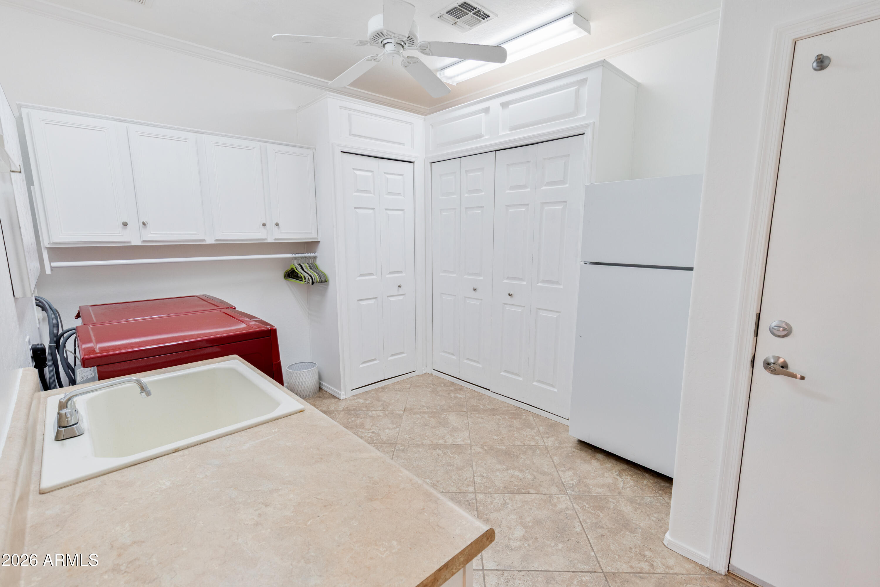 6530 West Bent Tree Drive Phoenix, AZ 85083 - Photo 32 of 42 a room that has a bed and a dresser in it