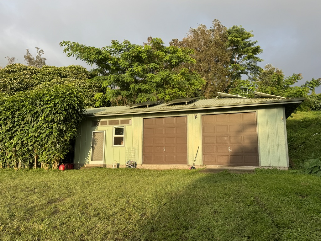 87-2854 Hawaii Belt Road Captain Cook, HI 96704 - Photo 11 of 30 front view of house with a yard