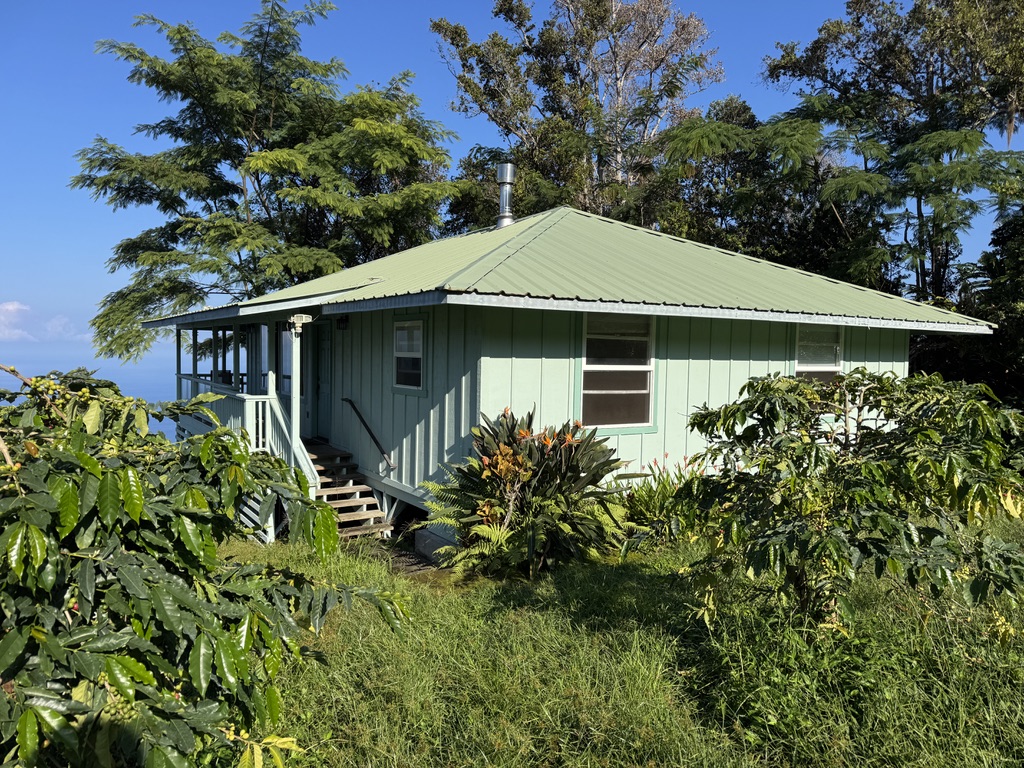 87-2854 Hawaii Belt Road Captain Cook, HI 96704 - Photo 12 of 30 a front view of house with garden