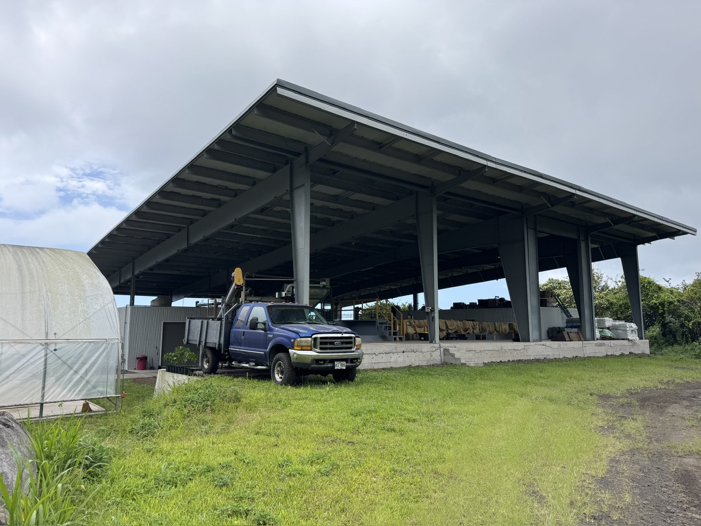 87-2854 Hawaii Belt Road Captain Cook, HI 96704 - Photo 17 of 30 a view of a house with backyard and porch