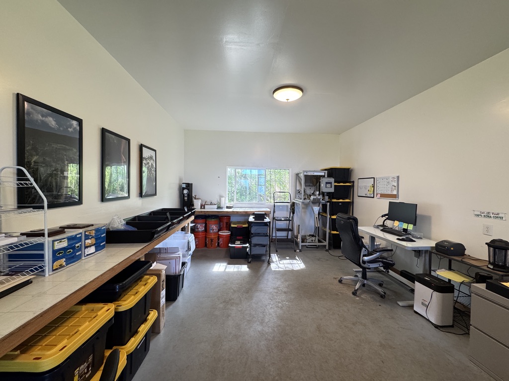 87-2854 Hawaii Belt Road Captain Cook, HI 96704 - Photo 24 of 30 a living room with furniture and a flat screen tv