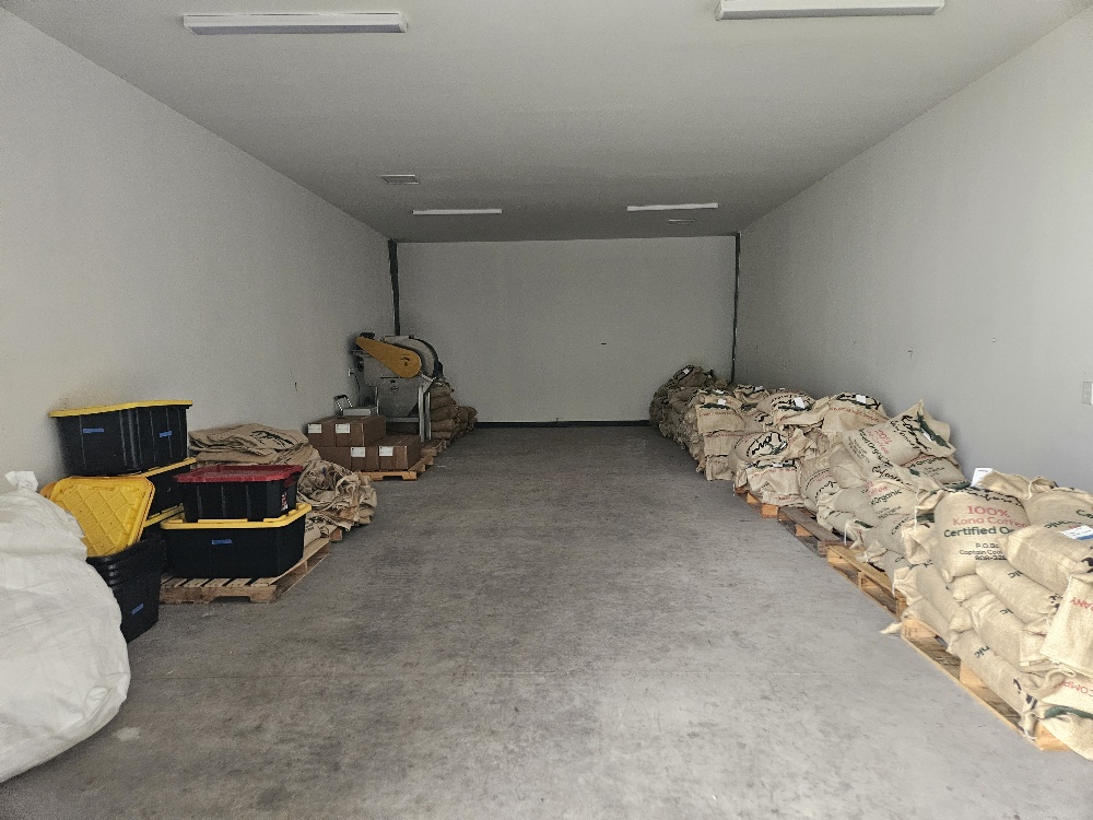 87-2854 Hawaii Belt Road Captain Cook, HI 96704 - Photo 28 of 30 a bedroom with a bed and window