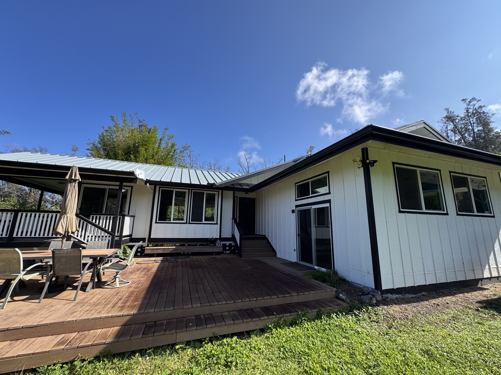 87-2854 Hawaii Belt Road Captain Cook, HI 96704 - Photo 7 of 30 a view of a house with backyard and sitting area