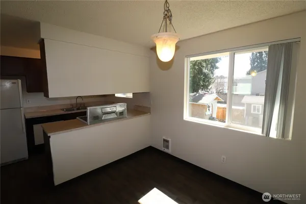 a room with furniture and window