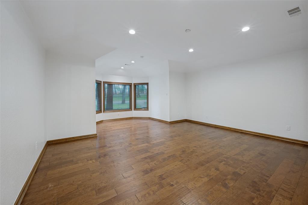 1607 North Main Street Euless, TX 76039 - Photo 39 of 39 a view of an empty room with a window