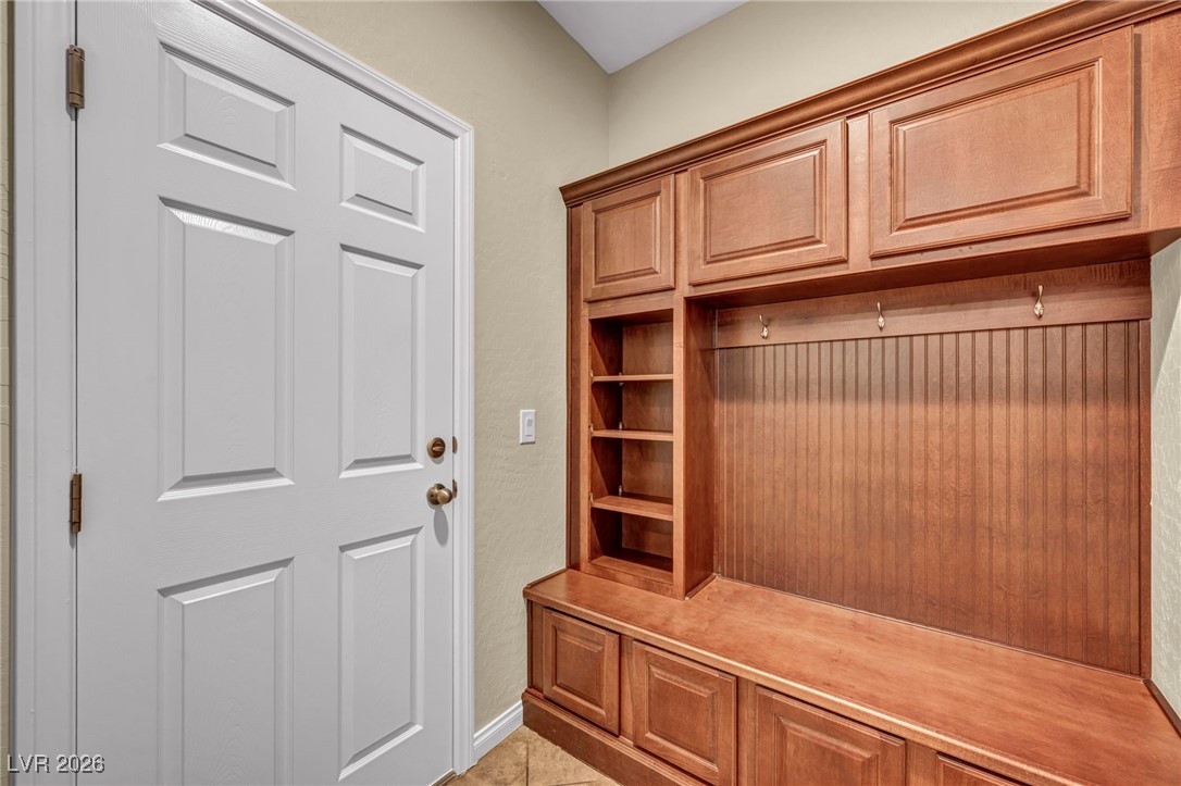 356 Aqua Springs Road Las Vegas, NV 89148 - Photo 18 of 39 Mudroom featuring light tile patterned flooring