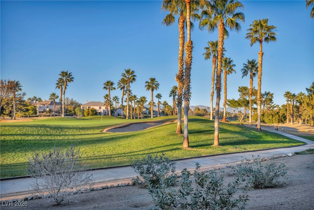 356 Aqua Springs Road Las Vegas, NV 89148 - Photo 38 of 39 Surrounding community with a lawn and view of golf course