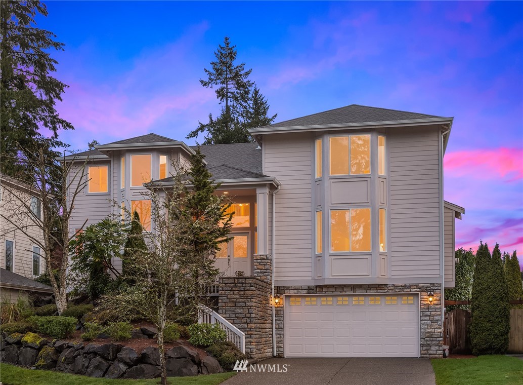 4209 Northeast 27th Place Renton, WA 98059 - Photo 2 of 35 a front view of a house with plants
