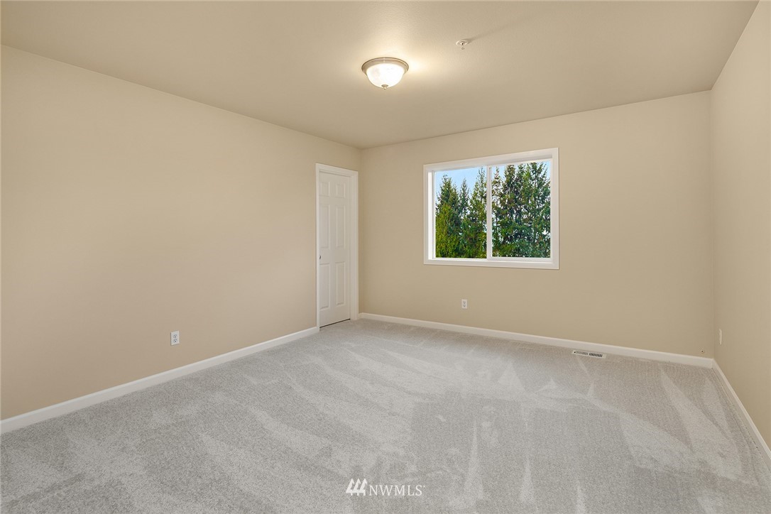 4209 Northeast 27th Place Renton, WA 98059 - Photo 26 of 35 an empty room with windows