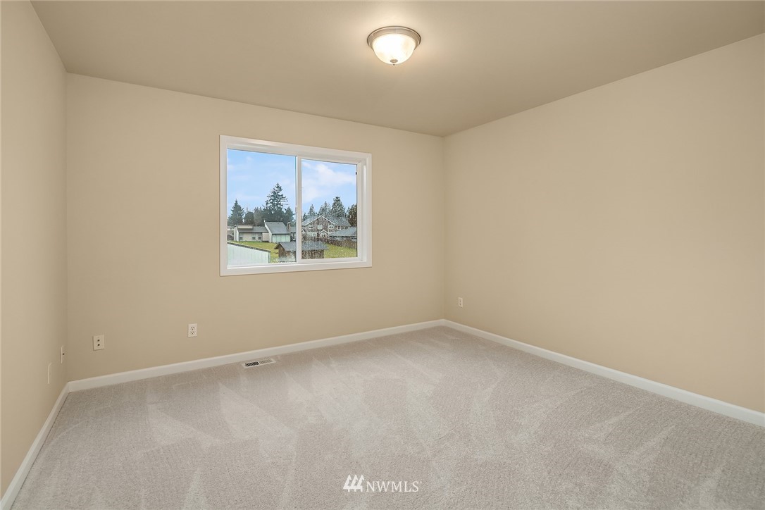 4209 Northeast 27th Place Renton, WA 98059 - Photo 27 of 35 an empty room with a window