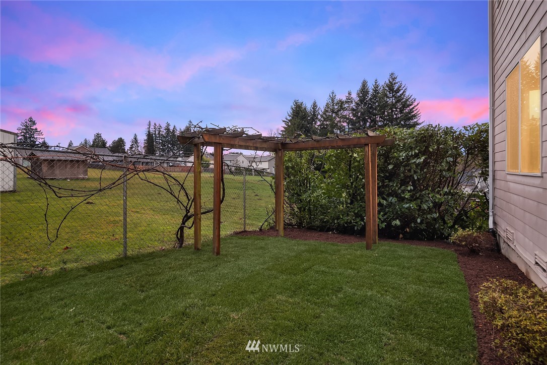 4209 Northeast 27th Place Renton, WA 98059 - Photo 33 of 35 a view of a lake with a yard