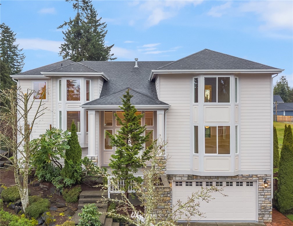 4209 Northeast 27th Place Renton, WA 98059 - Photo 35 of 35 a front view of a house with a yard